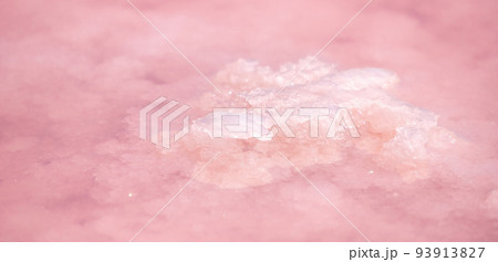 Pink salt crystals. Natural pink salt lake texture. Salt mining. Extremely salty pink lake, colored by microalgae with crystalline salt depositions 93913827