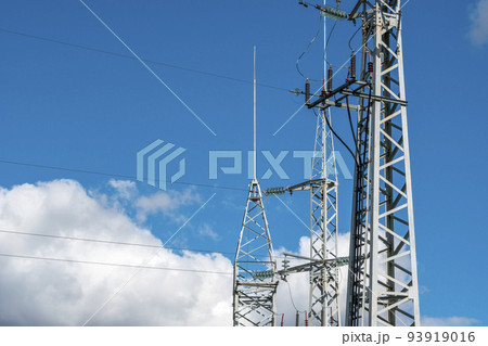 Three towers of high voltage power lines against the blue sky Three towers of high voltage power lines against the blue sky 93919016