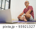 Asian senior man looking while exercises 93921327