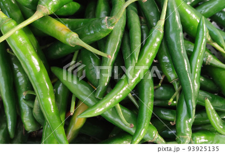 organic fresh green Chili Peppers at fresh opened market, nature ingredient backgrounds 93925135
