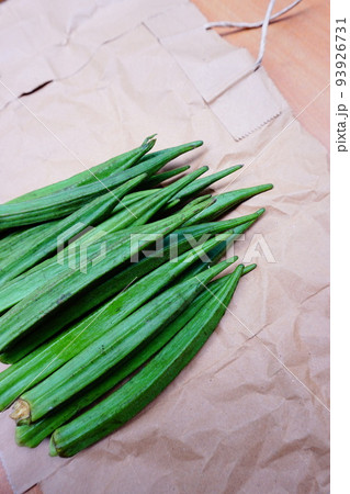 Lady's finger or okra on the brown paper Lady's finger or okra on the brown paper 93926731