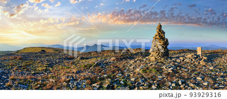 Summer sunrise Carpathian mountain top view from stony summit of Ihrovets Mount (Gorgany, Ukraine). 93929316