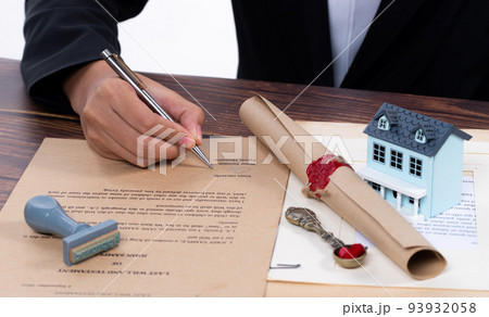 Lastwill Inheritance document Contract is approved by Lawyer to seal wax and stamp approval to finance and separate asset by justice law notary. They allocate insurance money real estate. copy space Lastwill Inheritance document Contract is approved by Lawyer to seal wax and stamp approval to finance and separate asset by justice law notary. They allocate insurance money real estate. copy space 93932058