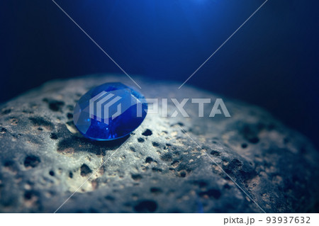 Blue Sapphire Gemstone on Natural Stone Blue Sapphire Gemstone on Natural Stone 93937632