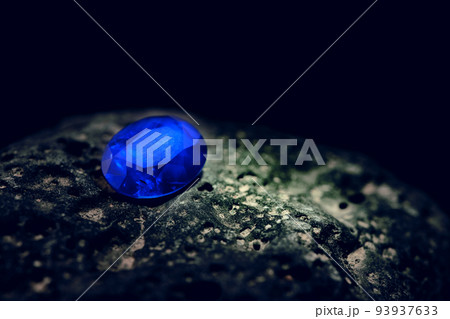 Blue Sapphire Gemstone on Natural Stone Blue Sapphire Gemstone on Natural Stone 93937633