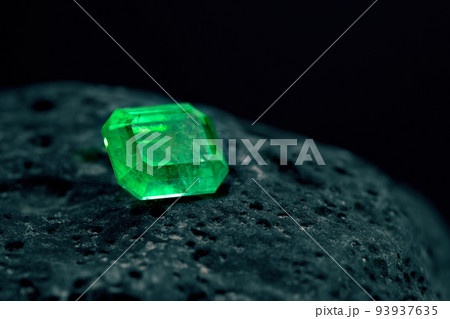 Luxury Emerald Gemstone on Natural Stone Luxury Emerald Gemstone on Natural Stone 93937635