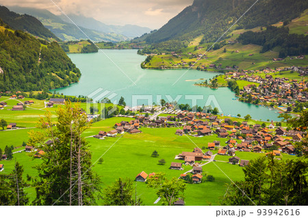 Aerial view on Lungern and turquoise lake, Switzerland, Europe Aerial view on Lungern and turquoise lake, Switzerland, Europe 93942616