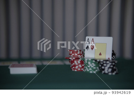 the poker game in casino chips cards and the poker table, winning combination in poker, flush royal 93942619