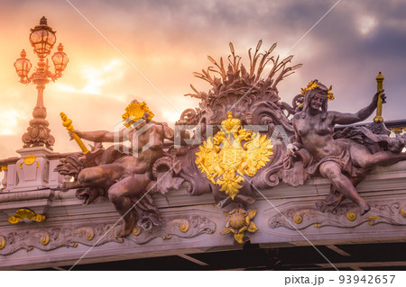 Golden sunrise and nymphs in Pont Alexandre III, Paris, france Golden sunrise and nymphs in Pont Alexandre III, Paris, france 93942657
