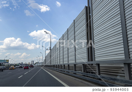 Daytime traffic on one of the streets in Moscow on a working day, Russia Daytime traffic on one of the streets in Moscow on a working day, Russia 93944003
