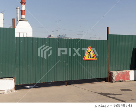 Gate and barrier of the checkpoint with a stop sign Gate and barrier of the checkpoint with a stop sign 93949543