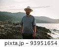 happy man wearing greek hat on summer vacation Corfu island 93951654
