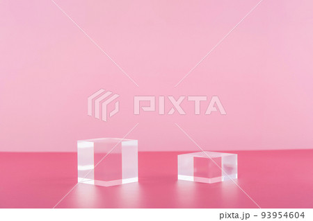 Acrylic blocks on pink background, pedestal cosmetic display glass podium platform for product presentation, geometric stand for cosmetics, mockup scene for jewellery 93954604