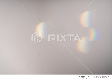 Blue light flare prism rainbow flares overlay effect on black background, light crossing crystals, prismatic sun catcher reflections rays. Abstract blurred colourful lens flare bokeh on dark Blue light flare prism rainbow flares overlay effect on black background, light crossing crystals, prismatic sun catcher reflections rays. Abstract blurred colourful lens flare bokeh on dark 93954697