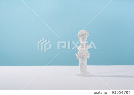 Cosmetic display podium platform greek man with roman marble column for product presentation, cosmetics geometric stand stylish props, mockup scene aesthetic on blue. Creative product stage.. Cosmetic display podium platform greek man with roman marble column for product presentation, cosmetics geometric stand stylish props, mockup scene aesthetic on blue. Creative product stage.. 93954704
