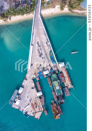 Aerial view of Thong Sala pier, boat and koh Tae Nai in koh Phangan, Thailand Aerial view of Thong Sala pier, boat and koh Tae Nai in koh Phangan, Thailand 93956435