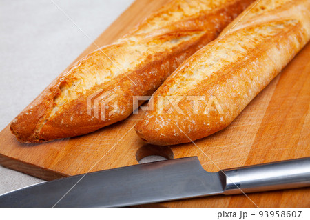 Image of crunchy homemade fresh baked baguettes 93958607