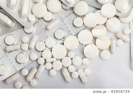 Various pills and medical pills, antibiotics closeup 93958739