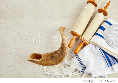 Yom kippur concept. Tallit, Thorah and Shofar jewish religious symbols Yom kippur concept. Tallit, Thorah and Shofar jewish religious symbols 93968377