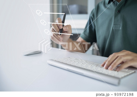 Businessman work from home handling documents E-signing, signing digital contracts electronic signing electronic signature through internet technology document data management smart contract agreement Businessman work from home handling documents E-signing, signing digital contracts electronic signing electronic signature through internet technology document data management smart contract agreement 93972198
