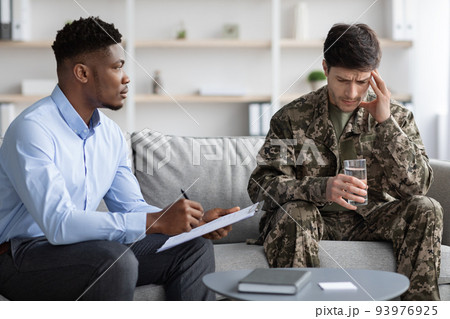 African american psychotherapist having session with soldier African american psychotherapist having session with soldier 93976925