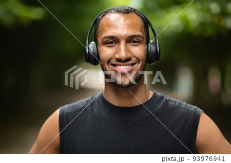 Closeup portrait of african american young athlete training in park Closeup portrait of african american young athlete training in park 93976941