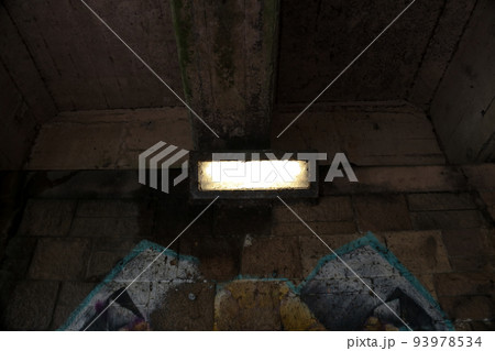 Lamp Under a Railway Bridge with Graffiti 93978534