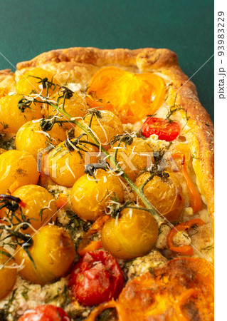 Savory pie with tomatoes Savory pie with tomatoes 93983229