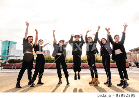 Young Asian team happy looking at camera. Chinese teenage friends at sunset 93992899