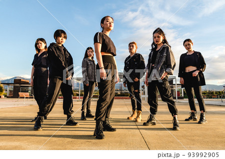 Young Asian team posing looking at camera Young Asian team posing looking at camera 93992905