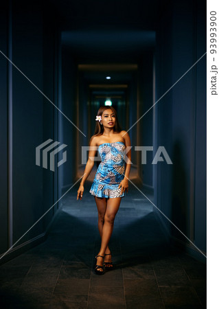 Indoor fashion portrait of young smiling woman posing in the corridor Indoor fashion portrait of young smiling woman posing in the corridor 93993900