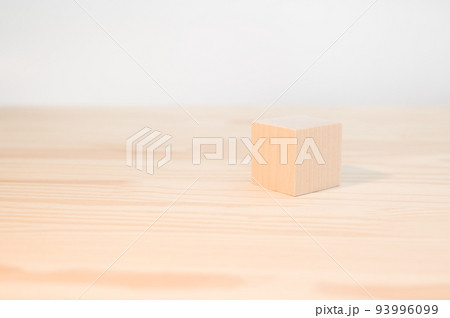 One wooden cube for your text, icons, sign and symbols to create your creative concepts. Mock up blank wooden cube, block. One wooden cube for your text, icons, sign and symbols to create your creative concepts. Mock up blank wooden cube, block. 93996099