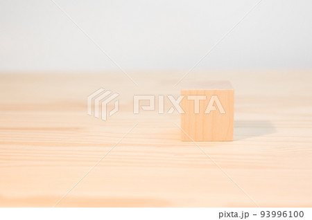 One wooden cube for your text, icons, sign and symbols to create your creative concepts. Mock up blank wooden cube, block. 93996100