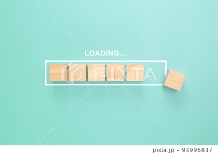 Showing loading bar with wood cube on pastel background. Progress bar made from wooden cubes. Loading. Top view Showing loading bar with wood cube on pastel background. Progress bar made from wooden cubes. Loading. Top view 93996837