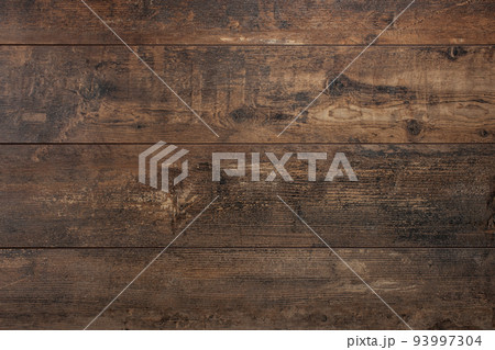 Wooden background. Texture with an old, rustic, brown planks. dark wood texture. background old dark panels 93997304