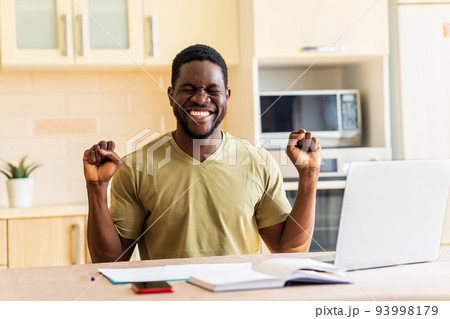 latin hispanic man freelancer using laptop studying online working from home latin hispanic man freelancer using laptop studying online working from home 93998179
