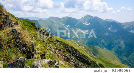 fagaras mountain ridge. beautiful summer landscape of romania. sunny morning. green rocky cliffs. beautiful nature background 93999068