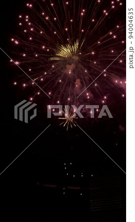 Fireworks light up the sky with dazzling display. Fireworks light up the sky with dazzling display. 94004635