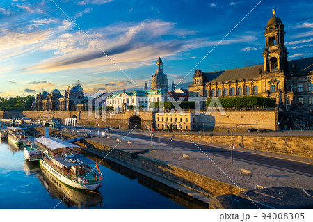 Sunrise view of the Old Town architecture with Elbe river embankment in Dresden, Saxony, Germany Sunrise view of the Old Town architecture with Elbe river embankment in Dresden, Saxony, Germany 94008305