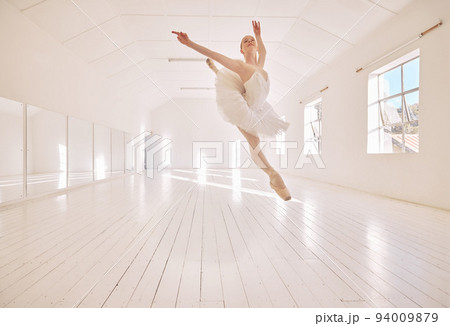 Ballet dance, jump and studio dancer dancing beautiful, elegant or classic performance in theater room. Stage artist, professional theatre ballerina and creative woman with energy moving with beauty Ballet dance, jump and studio dancer dancing beautiful, elegant or classic performance in theater room. Stage artist, professional theatre ballerina and creative woman with energy moving with beauty 94009879