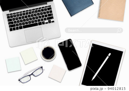 High angle view of a setting table with digital equipment and accessories of business workplace on modern background. High angle view of a setting table with digital equipment and accessories of business workplace on modern background. 94012815