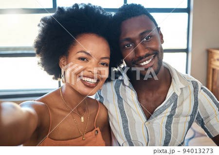 Couple, people and black woman and man in a selfie portrait on a lovely, happy and beautiful date together. Smile, romantic and young boyfriend and girlfriend taking pictures for social media content 94013273