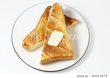 体に悪いこんがり焼けた厚切りトースト、バターのせ 体に悪いこんがり焼けた厚切りトースト、バターのせ 94013879
