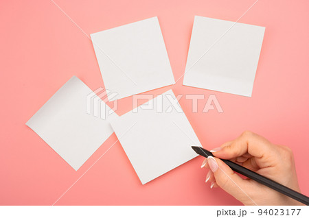 Mockup sticky Note Paper. Hand written notes black pencil on white sticker. pink table background. Mockup sticky Note Paper. empty sheet for notes on pink bulletin board Mockup sticky Note Paper. Hand written notes black pencil on white sticker. pink table background. Mockup sticky Note Paper. empty sheet for notes on pink bulletin board 94023177