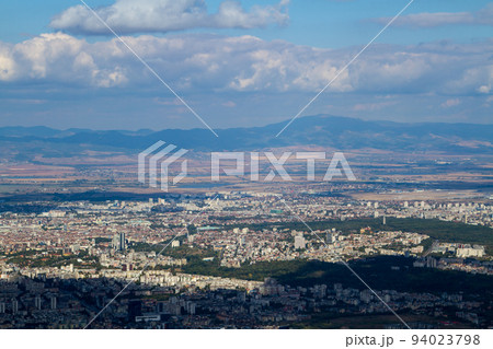 Aerial view of the city of Sofia, Bulgaria. The capital of Bulgaria is located in the west of the country at the foot of the Vitosha mountain range. History of city has more than two thousand years. Aerial view of the city of Sofia, Bulgaria. The capital of Bulgaria is located in the west of the country at the foot of the Vitosha mountain range. History of city has more than two thousand years. 94023798