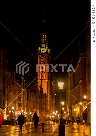 View of Dlugi Targ and Dluga Street in Old Town at night. Main Town Hall at night. Gdansk is the historical capital of Polish Pomerania. Famous Long Lane street in the Gdansk old city at night, Poland View of Dlugi Targ and Dluga Street in Old Town at night. Main Town Hall at night. Gdansk is the historical capital of Polish Pomerania. Famous Long Lane street in the Gdansk old city at night, Poland 94024317