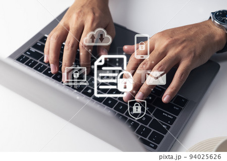 Concept of data protection with a man using a laptop Concept of data protection with a man using a laptop 94025626