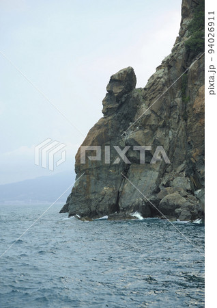 Rocks clif mountains sea, place near resort town Gurzuf. southern coast of the Black Sea, Crimea 94026911