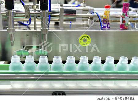 White plastic Bottles transfer on Automated conveyor systems industrial automation for package White plastic Bottles transfer on Automated conveyor systems industrial automation for package 94029482