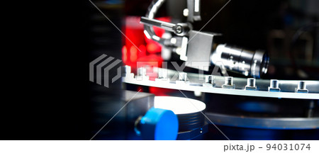 High-quality control in manufacturing optical sorting machine for fasteners nuts in product line, copy space High-quality control in manufacturing optical sorting machine for fasteners nuts in product line, copy space 94031074